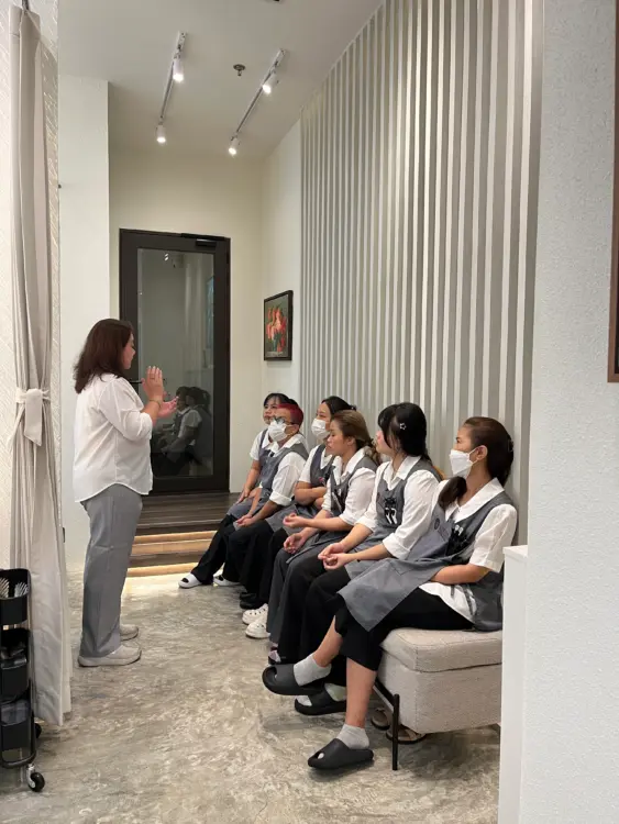 Siesta Head Spa therapists joining an internal training session to improve knowledge, care quality, and service consistency